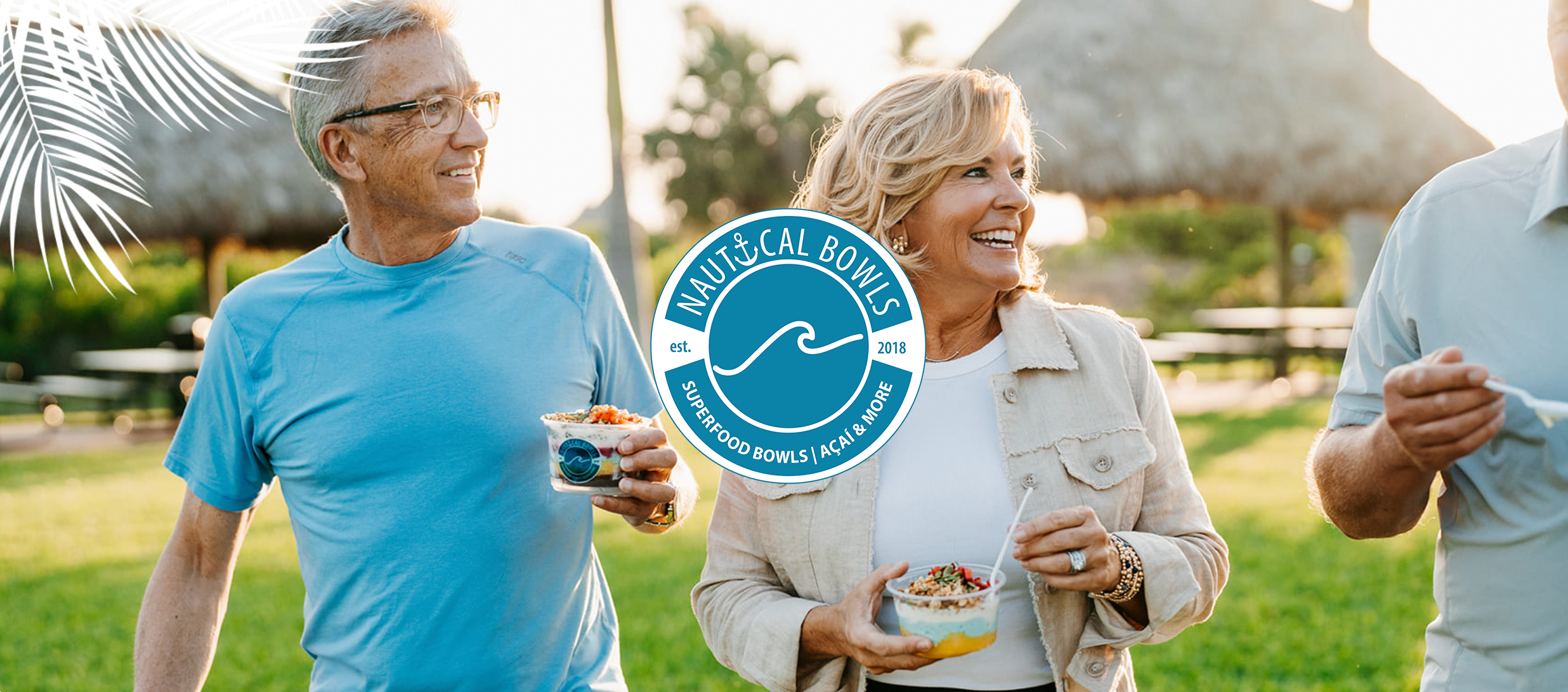 People walking outside eating Nautical Bowls
